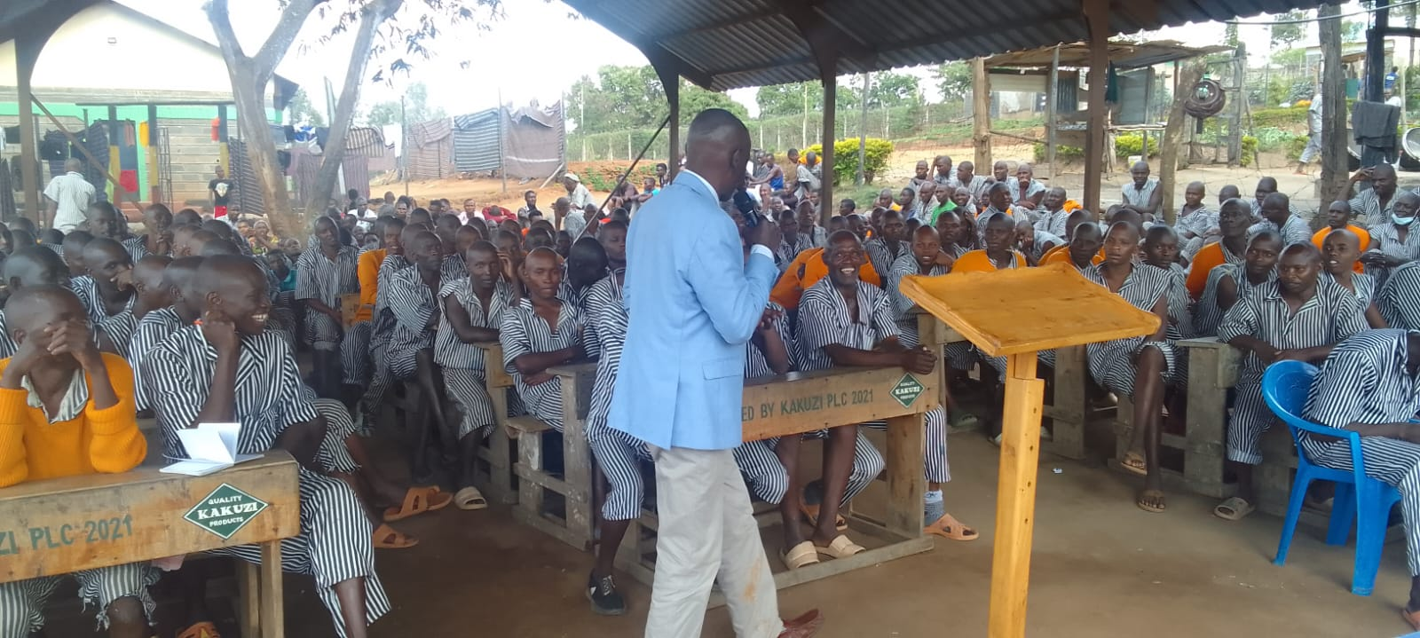 Pastor David Kimama preaching to inmates during a Tumaini Prison Empowerment outreach visit