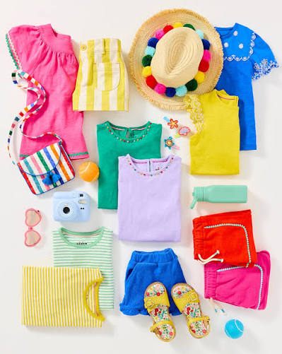 A colourful collection of children's clothing ready to donate